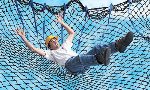 Technician installing a balcony safety net in Mumbai