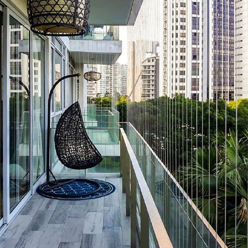 Stainless steel invisible grill on a high-rise window